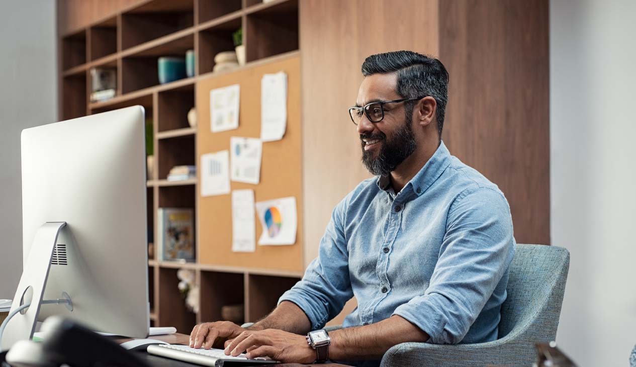 Website Developer working on computer